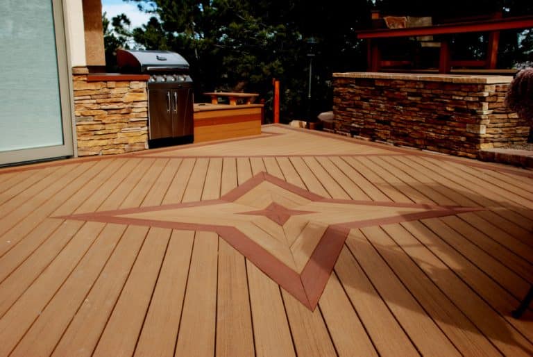 Evergrain decking, custom benches, built-in grill, Rockrimmon
